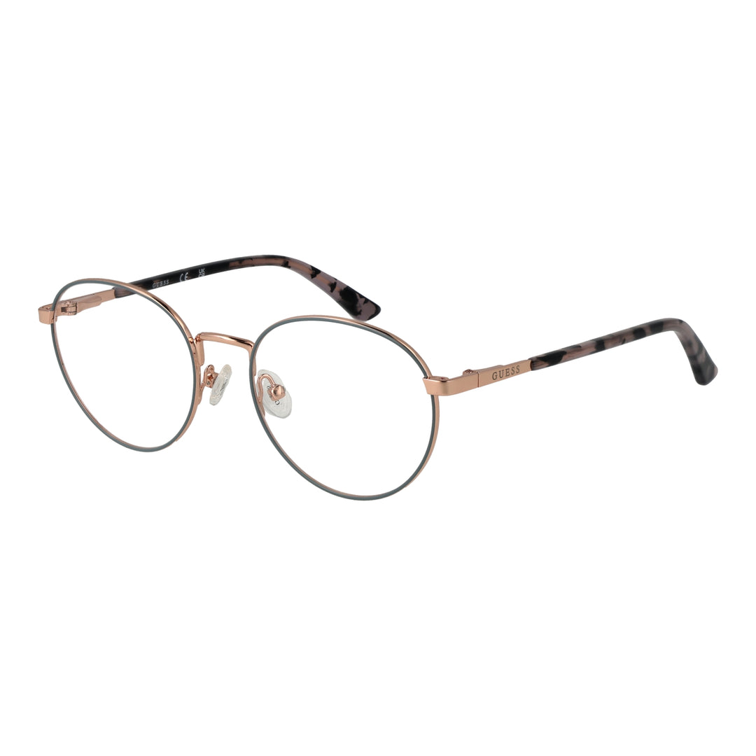 Rose gold thin metal round eyeglasses with tortoiseshell temple tips on neutral background