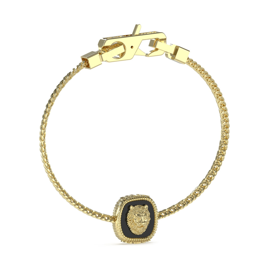 Gold chain bracelet with black square pendant featuring engraved lion head on a Man's wrist