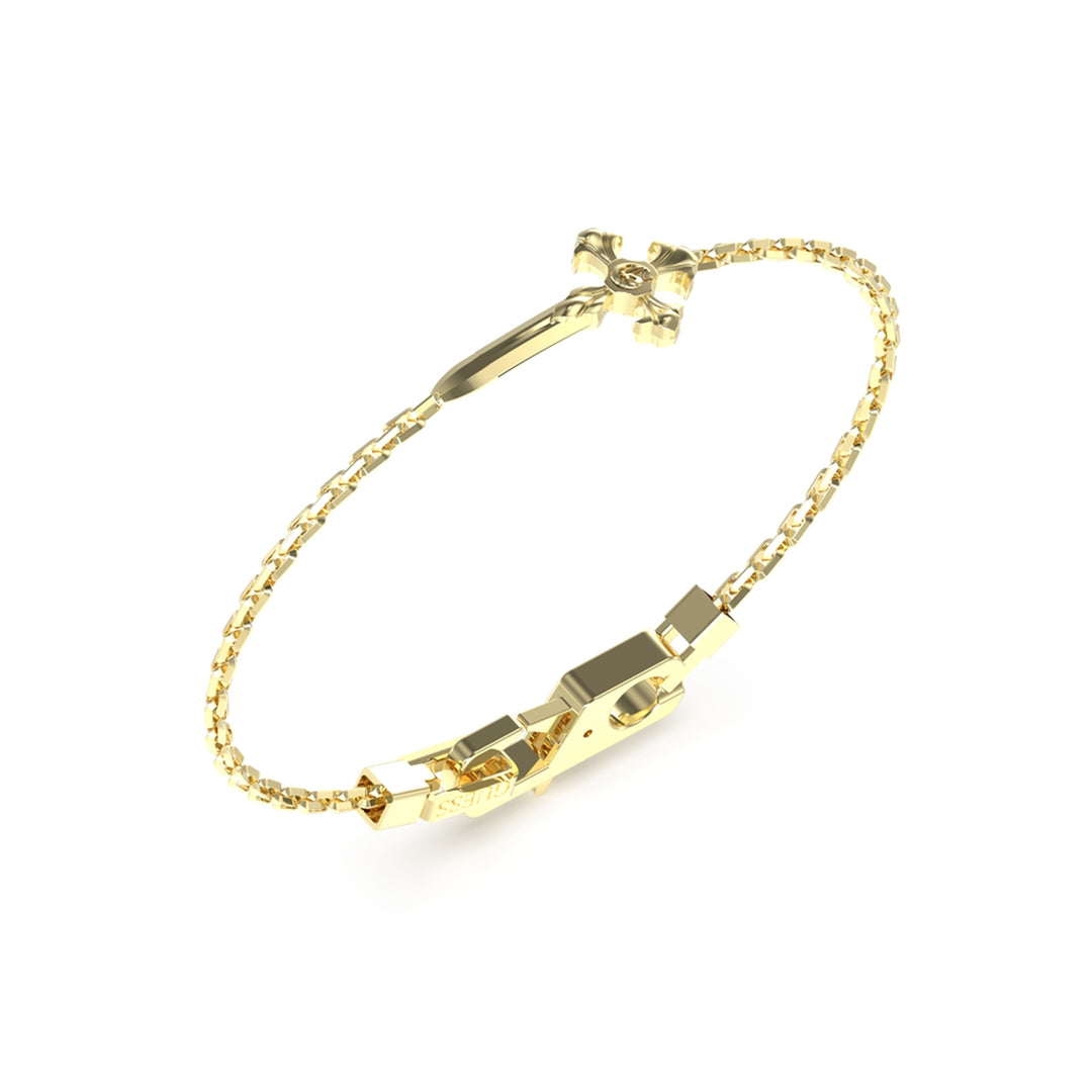 Gold chain bracelet featuring a small cross pendant and secure clasp on a neutral background