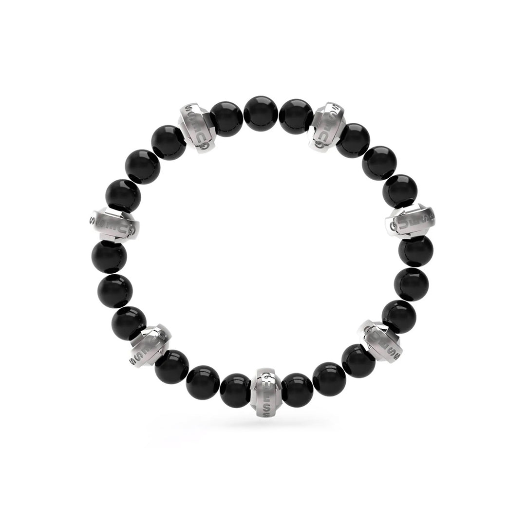 Black polished bead bracelet with silver engraved metal rings on neutral background