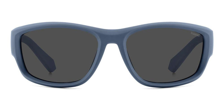 Blue plastic wrap-around sunglasses with black polarized lenses on white background, sporty profile