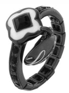 Modern black and white ring with flower-shaped setting and square center stone on linked shiny band