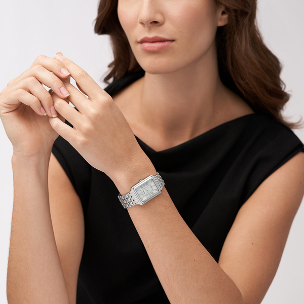 Silver rectangular Fossil watch with mother-of-pearl dial and crystal accents on stainless steel bracelet