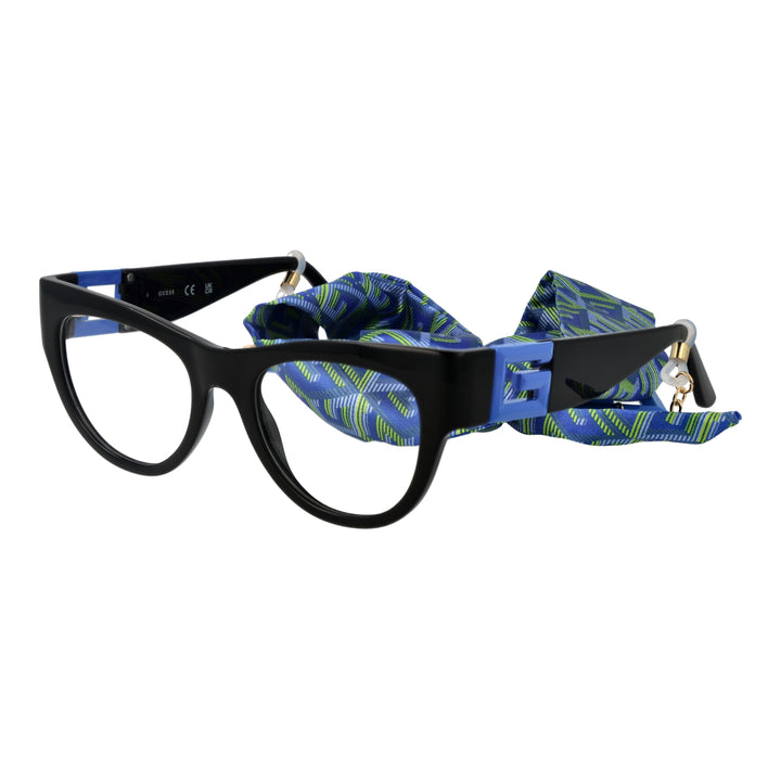 Black, blue, and green retro cat-eye eyeglasses with decorative blue &